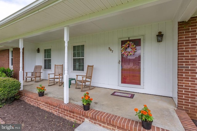 307 Butternut Dr, Fredericksburg, VA 22408 - doorway to property with a porch and brick siding