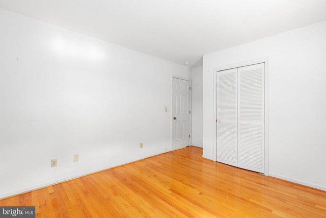 307 Butternut Dr, Fredericksburg, VA 22408 - unfurnished bedroom featuring light wood-style floors and a closet