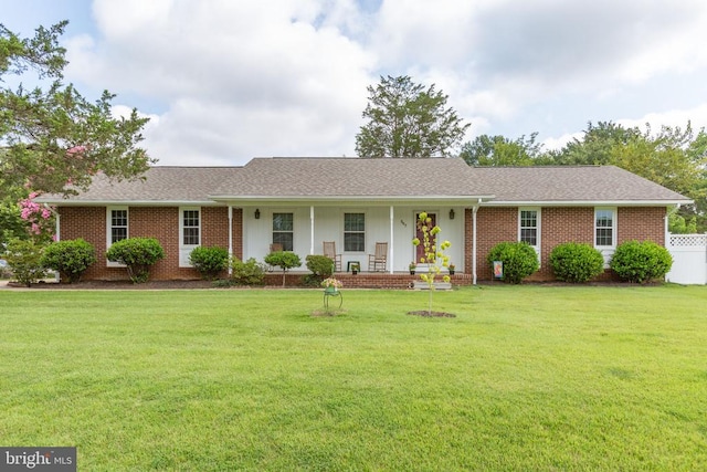 307 Butternut Dr, Fredericksburg, VA 22408 - single story home with a porch, roof with shingles, and brick siding