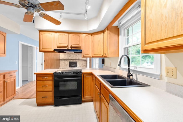 307 Butternut Dr, Fredericksburg, VA 22408 - kitchen featuring rail lighting, electric range, light countertops, decorative backsplash, and dishwasher