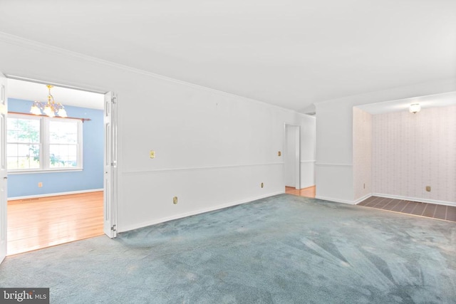 307 Butternut Dr, Fredericksburg, VA 22408 - empty room featuring a chandelier, carpet flooring, and ornamental molding