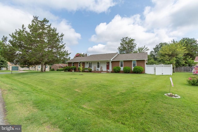 307 Butternut Dr, Fredericksburg, VA 22408 - ranch-style house featuring a porch and brick siding