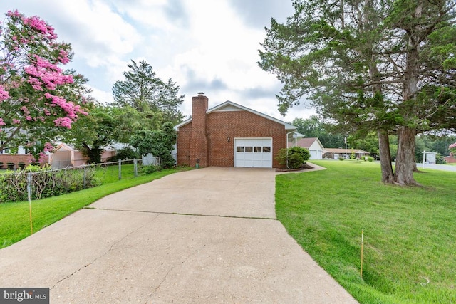 307 Butternut Dr, Fredericksburg, VA 22408 - view of front of property featuring a chimney, brick siding, driveway, and a garage