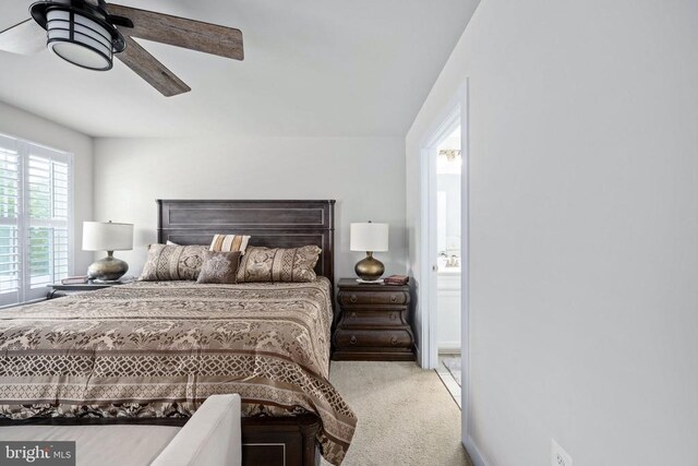 8859 Marlow Dr, Spotsylvania, VA 22551 - bedroom with carpet floors, ceiling fan, and connected bathroom
