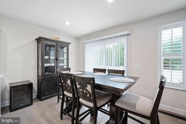 8859 Marlow Dr, Spotsylvania, VA 22551 - dining space with healthy amount of natural light, light wood-type flooring, and recessed lighting