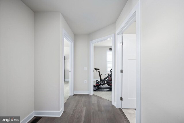 8859 Marlow Dr, Spotsylvania, VA 22551 - hall featuring wood finished floors and baseboards