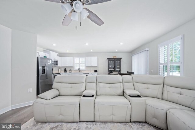 8859 Marlow Dr, Spotsylvania, VA 22551 - living area featuring wood finished floors, ceiling fan, and recessed lighting