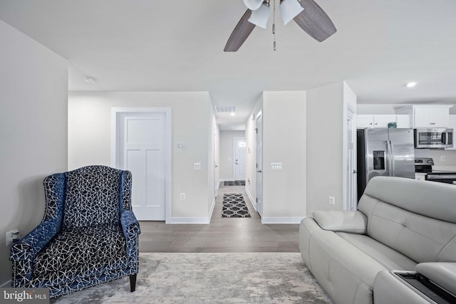 8859 Marlow Dr, Spotsylvania, VA 22551 - living area with wood finished floors and ceiling fan