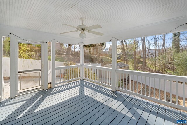 exterior space featuring a ceiling fan