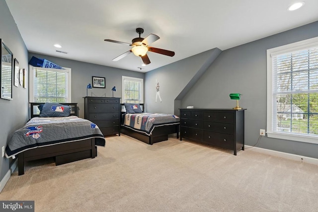 carpeted bedroom featuring baseboards, a ceiling fan, and recessed lighting