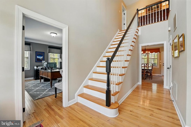 19254 Mabel Ct, Culpeper, VA 22701 - staircase with hardwood / wood-style floors, plenty of natural light, and baseboards