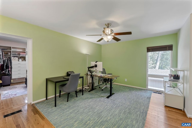 310 Gloucester Rd, Charlottesville, VA 22901 - home office with a ceiling fan and wood finished floors