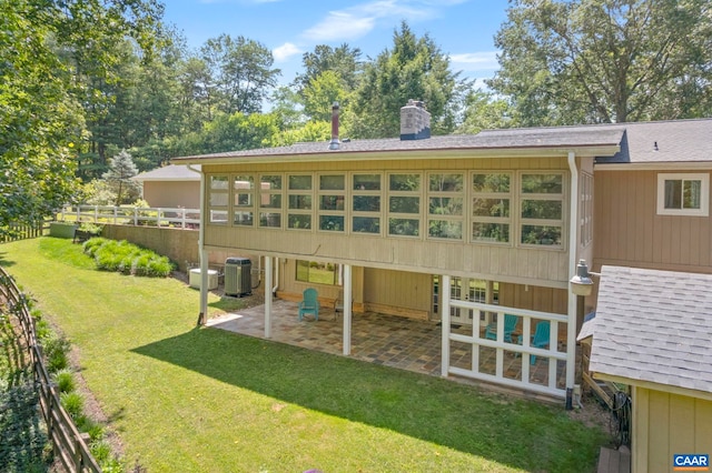 310 Gloucester Rd, Charlottesville, VA 22901 - rear view of house with a patio, a chimney, a lawn, and a shingled roof