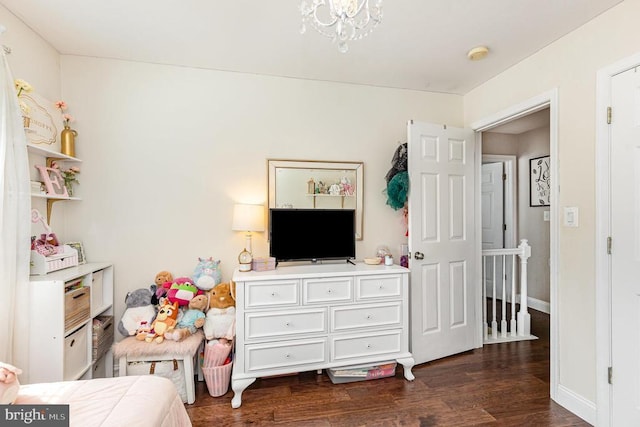 4511 Cornwall Ct, Fredericksburg, VA 22408 - bedroom featuring dark wood-style flooring and a chandelier