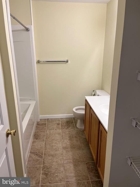 9808 Bartley Ct, Fredericksburg, VA 22408 - full bath featuring vanity, toilet, baseboards, and shower / washtub combination