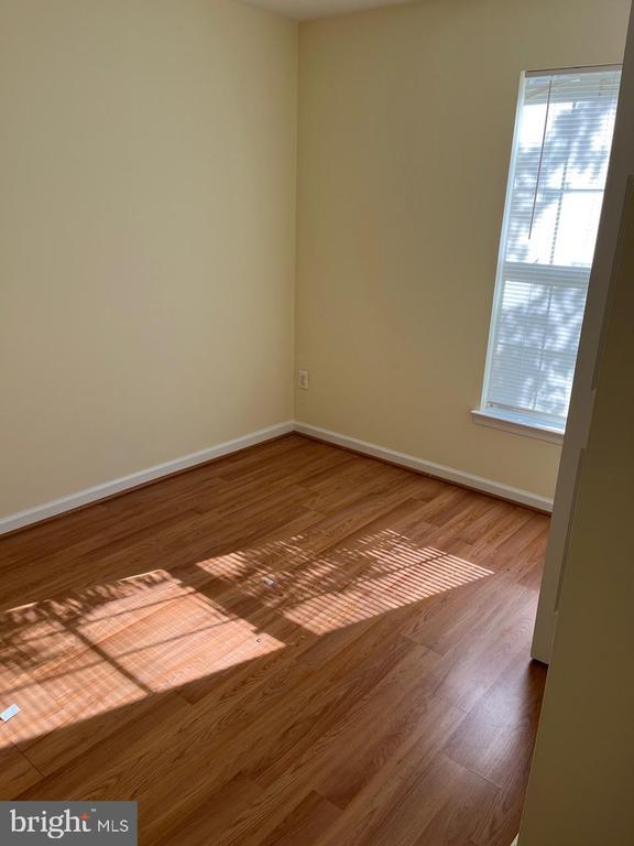 9808 Bartley Ct, Fredericksburg, VA 22408 - spare room with wood finished floors and baseboards