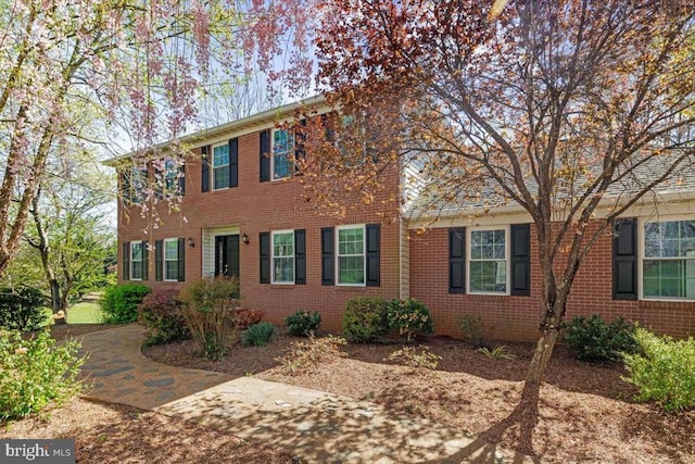 view of home's exterior featuring brick siding