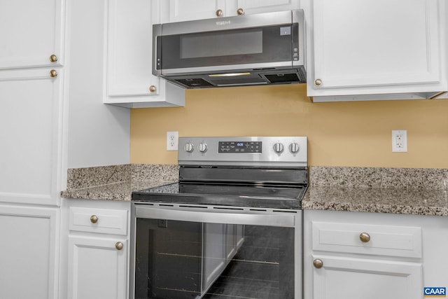 3615 Doctors Xing, Charlottesville, VA 22911 - kitchen with stainless steel appliances, white cabinetry, and light stone counters