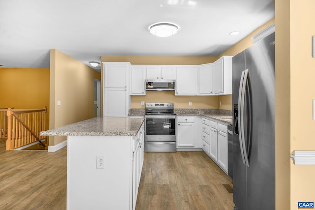 3615 Doctors Xing, Charlottesville, VA 22911 - kitchen with appliances with stainless steel finishes, light wood-style flooring, and white cabinetry