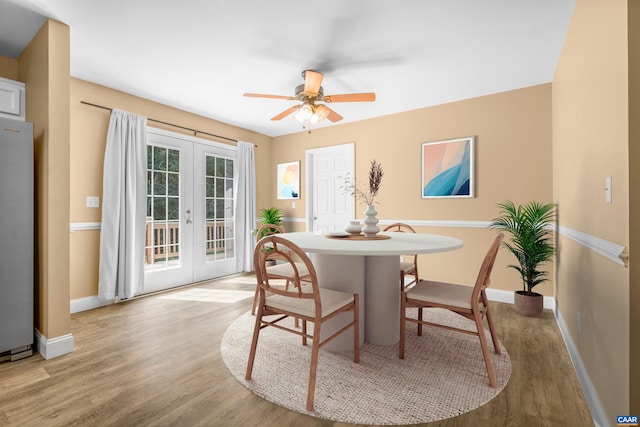3615 Doctors Xing, Charlottesville, VA 22911 - dining room featuring french doors, light wood-style floors, and ceiling fan