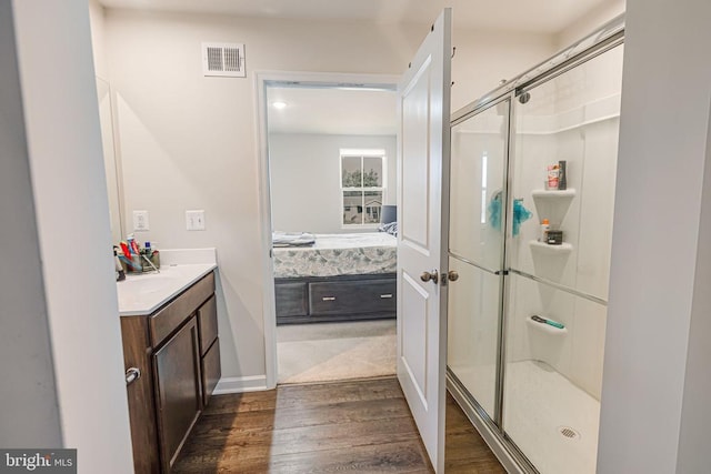 2612 High Pt, Culpeper, VA 22701 - ensuite bathroom featuring wood finished floors, a shower stall, vanity, and baseboards