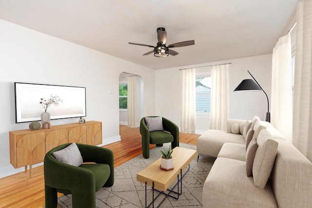 123 Fraser Ln, Staunton, VA 24401 - living area with arched walkways, healthy amount of natural light, light wood finished floors, and a ceiling fan