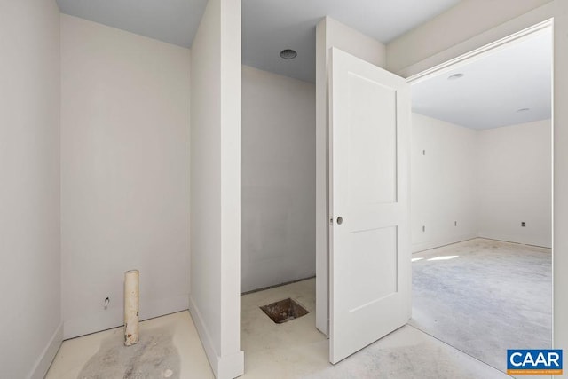 bathroom featuring concrete floors