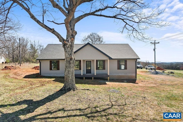 view of front of house featuring a shingled roof