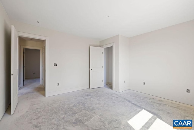 unfurnished bedroom with baseboards