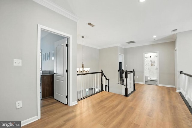 11220 Chivalry Chase Ln, Spotsylvania, VA 22551 - corridor with an upstairs landing, wood finished floors, a chandelier, ornamental molding, and recessed lighting