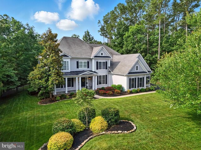 11220 Chivalry Chase Ln, Spotsylvania, VA 22551 - view of front of house with a porch, a standing seam roof, and a metal roof