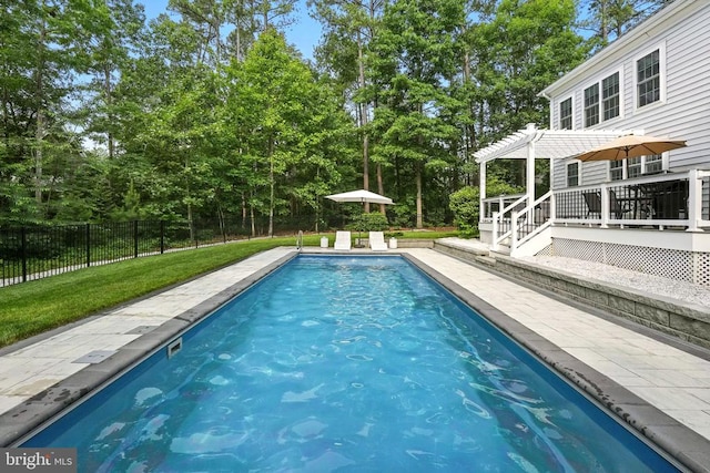 11220 Chivalry Chase Ln, Spotsylvania, VA 22551 - view of pool featuring a pergola and view of wooded area