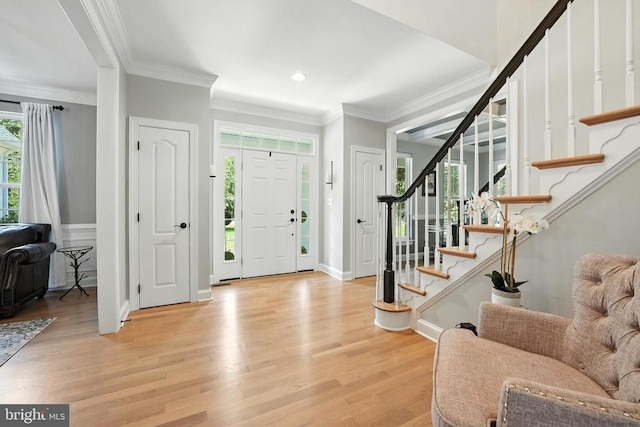 11220 Chivalry Chase Ln, Spotsylvania, VA 22551 - foyer entrance featuring wood finished floors, stairway, crown molding, and recessed lighting