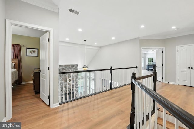 11220 Chivalry Chase Ln, Spotsylvania, VA 22551 - corridor featuring ornamental molding, wood finished floors, recessed lighting, and an upstairs landing