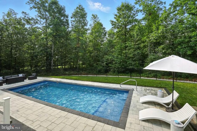 11220 Chivalry Chase Ln, Spotsylvania, VA 22551 - view of pool featuring outdoor lounge area, a patio area, and a fenced backyard
