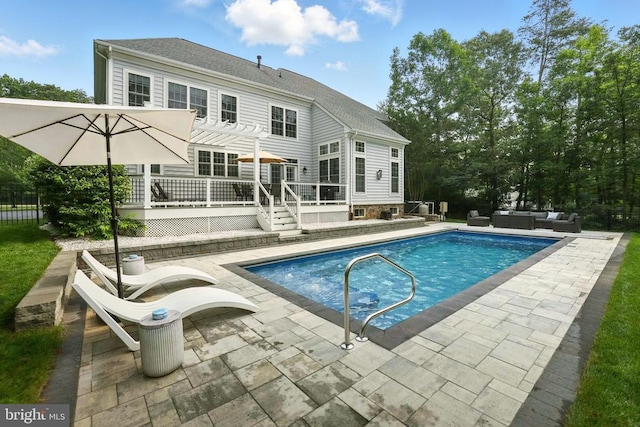 11220 Chivalry Chase Ln, Spotsylvania, VA 22551 - swimming pool featuring outdoor lounge area, a deck, a patio, and a pergola