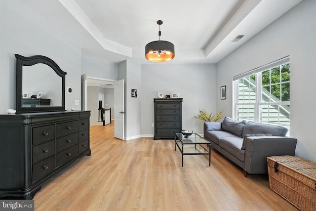 11220 Chivalry Chase Ln, Spotsylvania, VA 22551 - living room with a tray ceiling and light wood finished floors