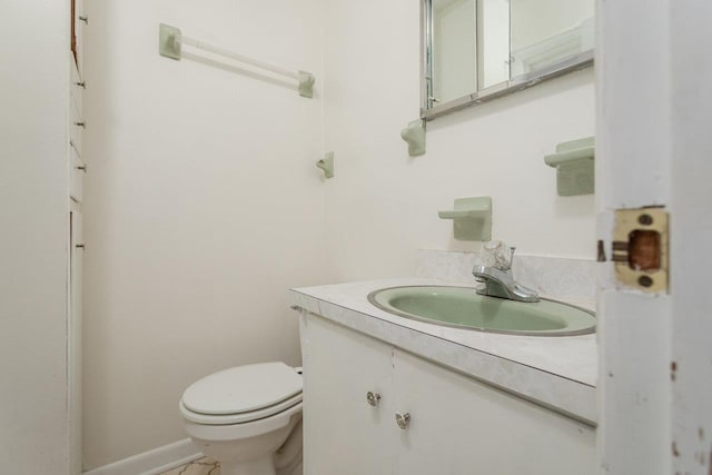 508 Stuart Ave N, Elkton, VA 22827 - half bathroom featuring vanity and toilet