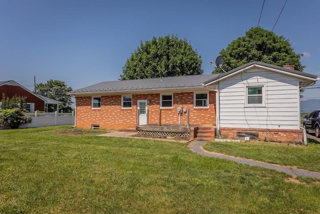 508 Stuart Ave N, Elkton, VA 22827 - view of front facade featuring crawl space, a metal roof, and brick siding