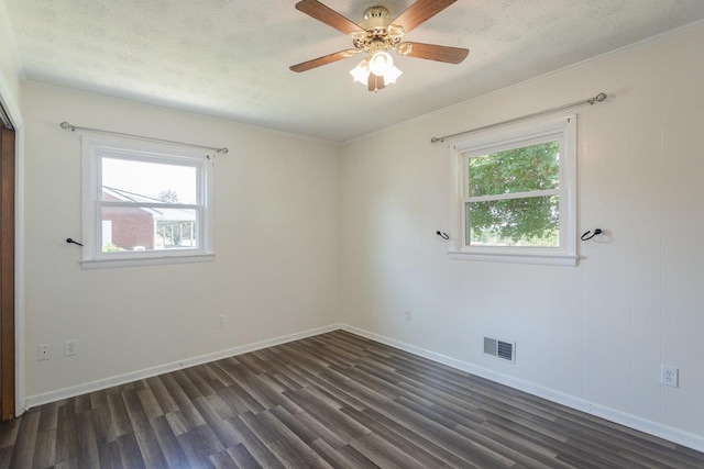 508 Stuart Ave N, Elkton, VA 22827 - unfurnished room featuring plenty of natural light, dark wood finished floors, crown molding, a textured ceiling, and ceiling fan