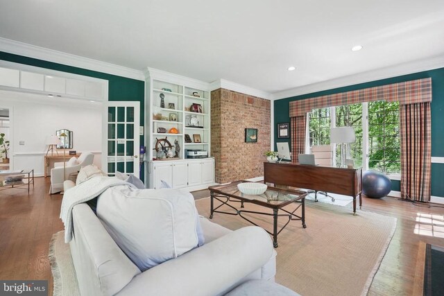  - living area with ornamental molding, wood finished floors, baseboards, and recessed lighting