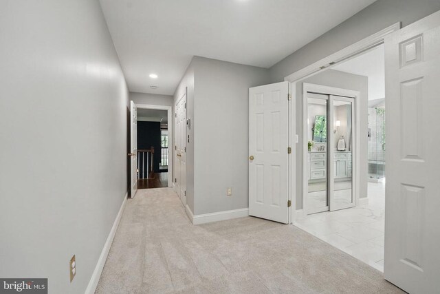  - hallway featuring baseboards, recessed lighting, and carpet floors