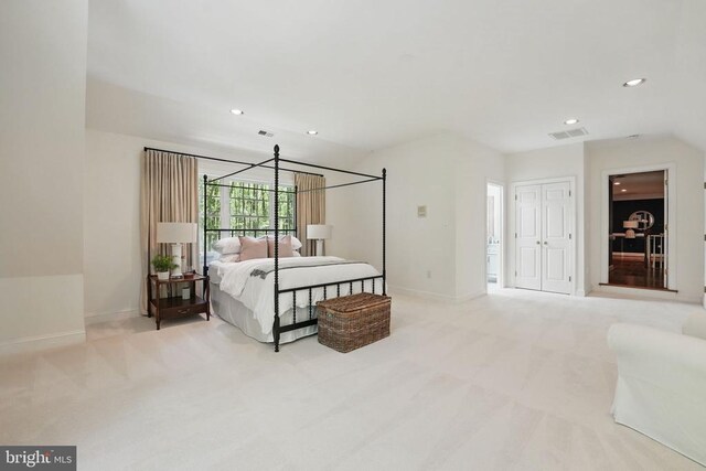  - bedroom with baseboards, light colored carpet, recessed lighting, and a closet