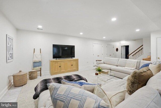  - living area featuring recessed lighting, stairs, baseboards, and light tile patterned flooring