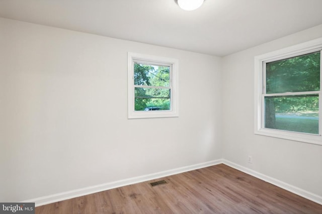 10443 Settle School Rd, Rixeyville, VA 22737 - unfurnished room with baseboards and wood finished floors