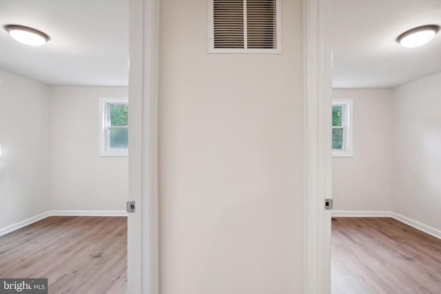 10443 Settle School Rd, Rixeyville, VA 22737 - hallway with wood finished floors, plenty of natural light, and baseboards