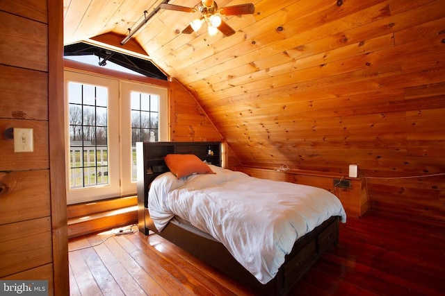 18075 Safe Haven Way, Culpeper, VA 22701 - bedroom with lofted ceiling, hardwood / wood-style flooring, and wooden walls