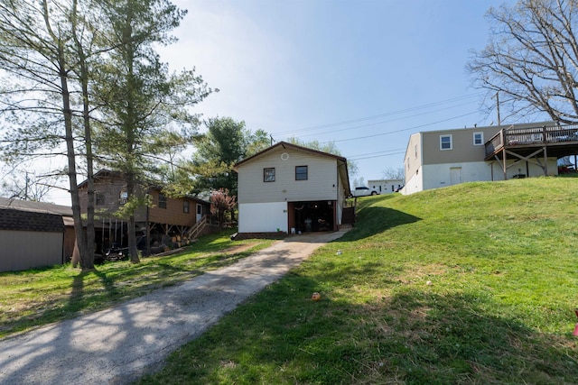 860 Fairfax Ave, Waynesboro, VA 22980 - view of property exterior featuring a lawn, an outdoor structure, driveway, and a wooden deck