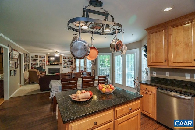 895 Jefferson Dr, Palmyra, VA 22963 - kitchen with dishwasher, dark wood-style flooring, ceiling fan, a fireplace, and dark stone countertops