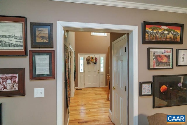 895 Jefferson Dr, Palmyra, VA 22963 - hallway with light wood-type flooring and crown molding